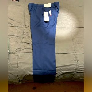 Calvin Klein slim fit, stretch dress pants 34x32, with tags.
